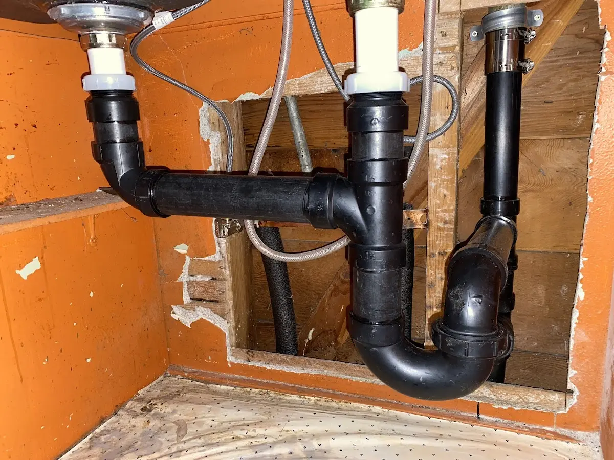 Professional Garbage Disposal Repair equipment and tools on the job in Powell